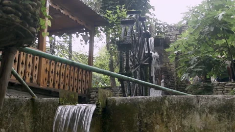 The water mill drives the water down Stock Footage 158994736