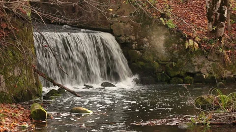 Water mill exit with falling water in autumn Stock Footage 35765557