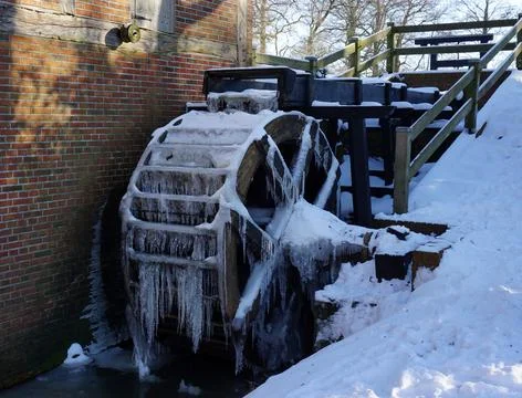Water mill with icicles Stock Photos