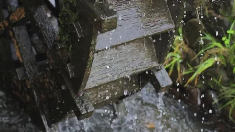 Water mill in the park close shot deep focus Stock Footage