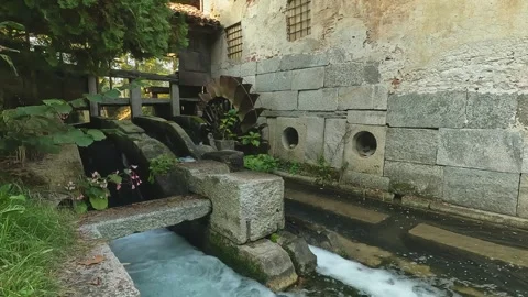 Water mill with rusty wheel Stock Footage 252594054