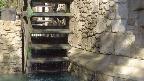 Water mill spinning Stock Footage 100974092