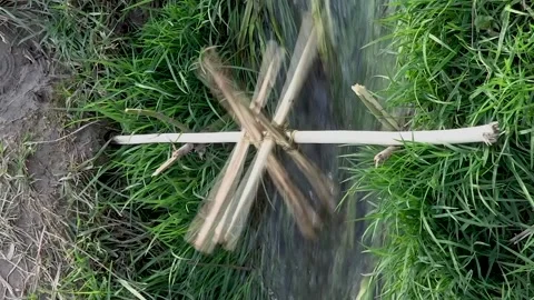 A water mill wheel made of branches Video stock 240348429