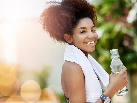 Water is the most important nutrient for active people. Cropped shot of a young Stock Photos
