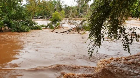 Water from mountain changes color after heavy rain. Stock Footage 80154706