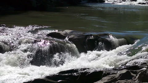 The water of the mountain river is broken on the rocks Stock Footage 41257043