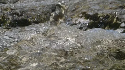 Water from a mountain river (close up, slow motion) Stock-Footage 212747761