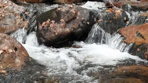 Water in a mountain river Stock Footage 252193627