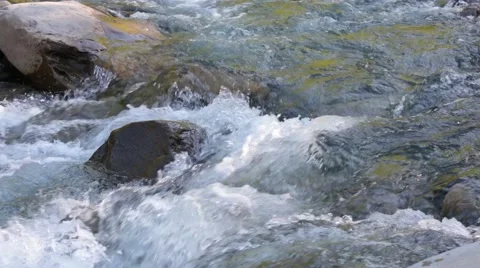 Water in a mountain stream Stock Footage 49973865