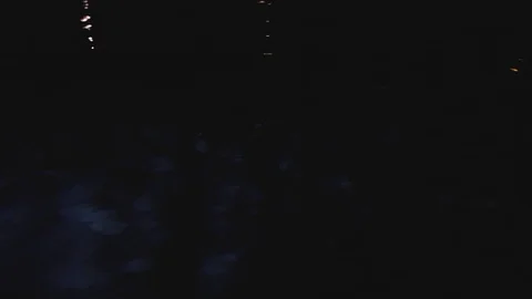 Water movement in the pool at night in the light of a lamp Stock-Footage 106335479