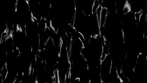 Water movements on a dark surface create patterns and shapes Stock Footage 344098403