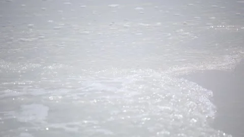 Water moving on white beach Stock Footage 172512332