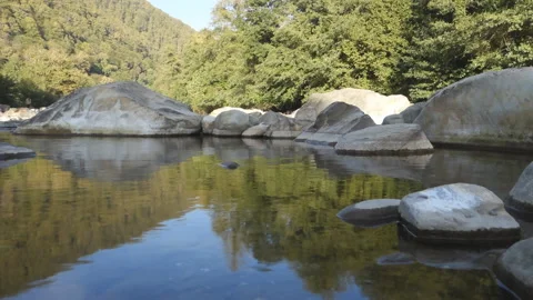 Water next to the rock Stock Footage 142734775