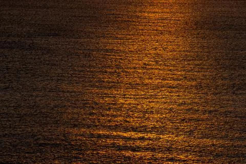 Water, ocean, light reflecting on waves, pattern, tranquil. Foto stock