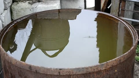 The water in the old barrel Stock Footage 50378642