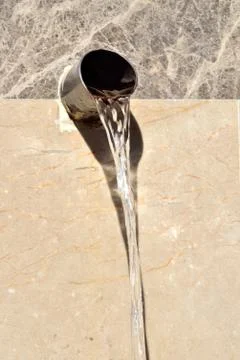 Water from old pump Stock Photos