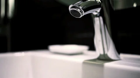 Water oouring from a Sink Stock Footage 34032192