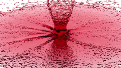 Water or wine toroidal drops colliding with splash on white background. Slow Stock Footage 262035324