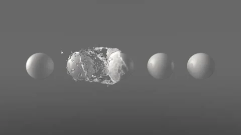 Water Orb Envelops White Spheres Stock Footage 130746588