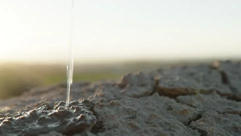 Water Over Cracks In Dry Soil Stock Footage 238779948