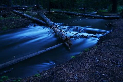 Water over log Stock Photos