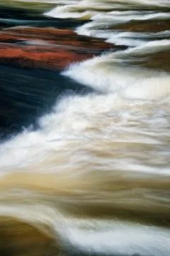 Water over stone Stock Photos