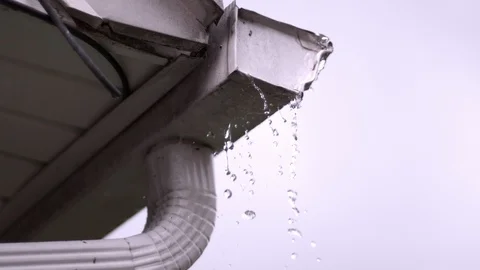Water overflowing from rain gutter in slow motion Stock Footage 93214822