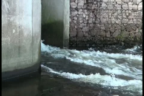 Water passes through a passage Stock Footage