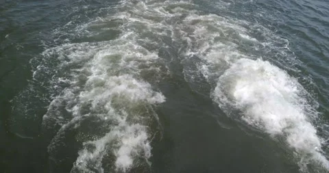 Water pattern of Boat engine idling at Ferry station / harbor - 4K Video stock 207796453