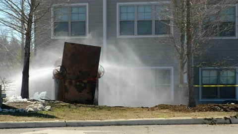 Water pipe burst due to cold weather at apartment building Stock Footage 148960142