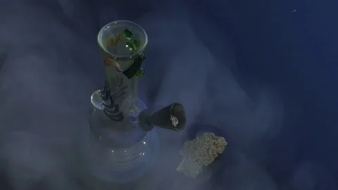 Water-pipe cannabis bud dark background Stock Footage 72518334