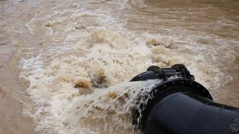 Water pipe while pumping flooding water Stock Footage 87027175