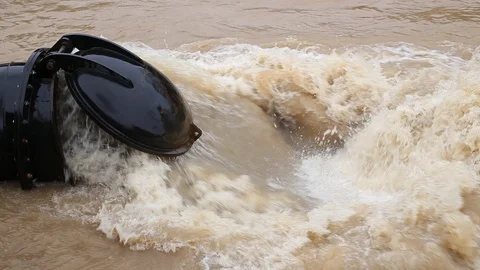 Water pipe while pumping flooding water Stock Footage 87027248