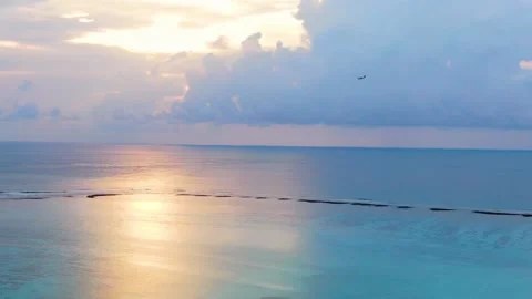 Water plane flyuing along Maldive paradise tropical island Stock Footage 197358097