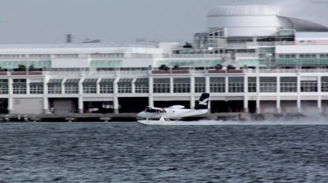 Water Plane taking off from Coal Harbor/ Canada Place VancoUVer Stock Footage 38603685