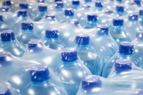 Water in plastic bottles. Stock Photos
