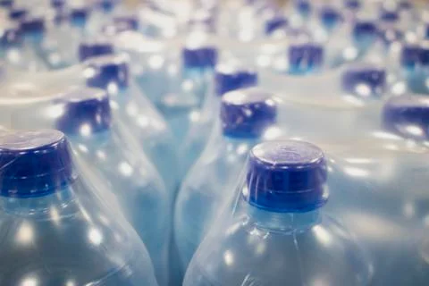 Water in plastic bottles. Stock Photos