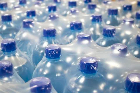 Water in plastic bottles. Stock Photos