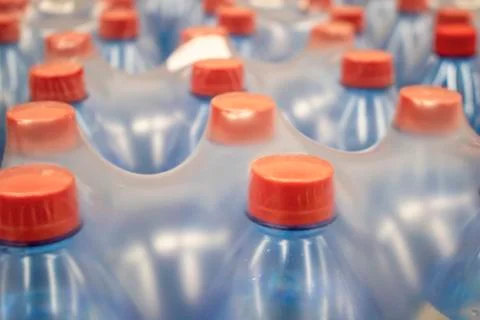Water in plastic bottles. Stock Photos