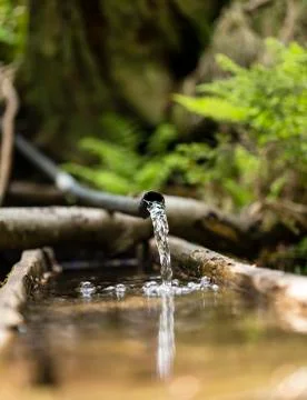 Water from a plastic pipe Stock-Fotos