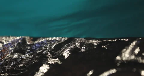 Water on plastic sheet Stock Footage 320441873