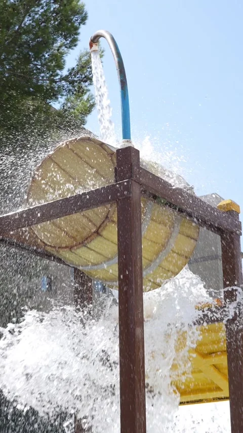 Water Playground Splash Feature with Large Yellow Tipping Bucket 스톡 동영상 346926204