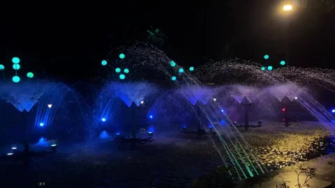 Water playing with RGB light Stock Footage 290231936