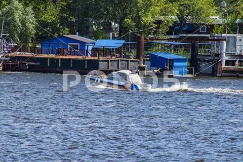 Water police boat with a siren. Stock Photos