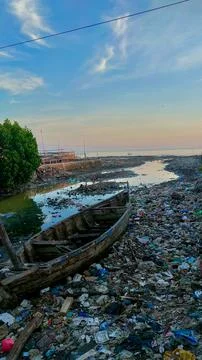 Water pollution due to human activities around downstream rivers and seas. .. Stock Photos