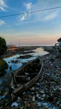 Water pollution due to human activities around downstream rivers and seas. .. Stock Photos