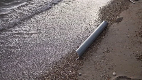 Water pollution plastic pipe at a coast Stock Footage 120779643