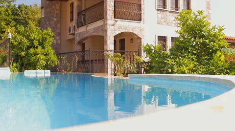 The water in the pool on the background of the house Stock Footage 43047477