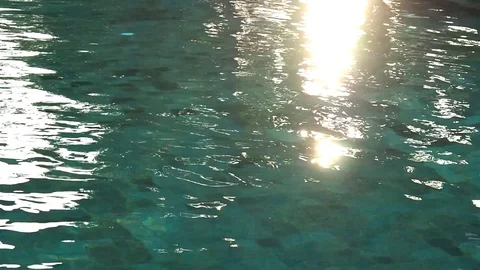 Water pool with sun light reflection texture. Stock Footage