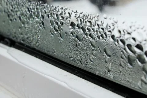 Water pooling on window still Stock Photos